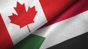 علم السودان مع علم كندا ضمن برامج الهجرة إلى كندا من السودان