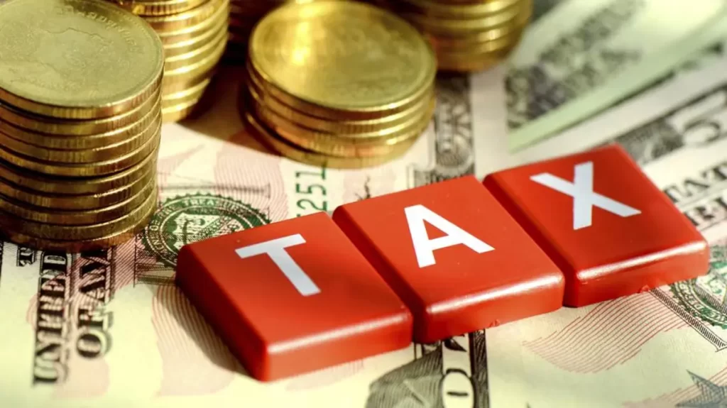 كلمة ضريبة باللغة الإنجليزية و قطع نقدية - تعبيرية- نظام الضرائب البرتغالي للأجانب